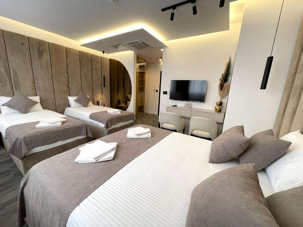 Postel nebo postele na pokoji v ubytování Hotel NPL CODE