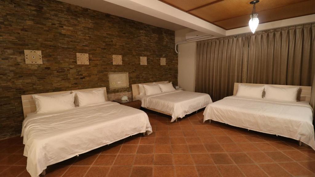 Postel nebo postele na pokoji v ubytování Bright Starry Hostel -Vacation in Donggang