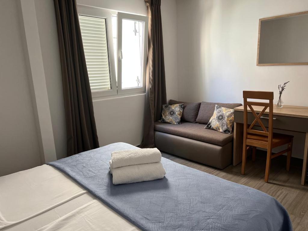 Postel nebo postele na pokoji v ubytování Apartman I & R