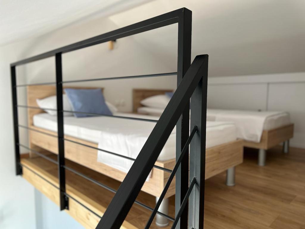 Postel nebo postele na pokoji v ubytování Apartman I & R