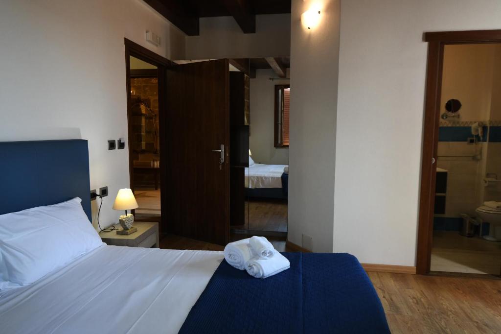Postel nebo postele na pokoji v ubytování Double B Maison De Charme