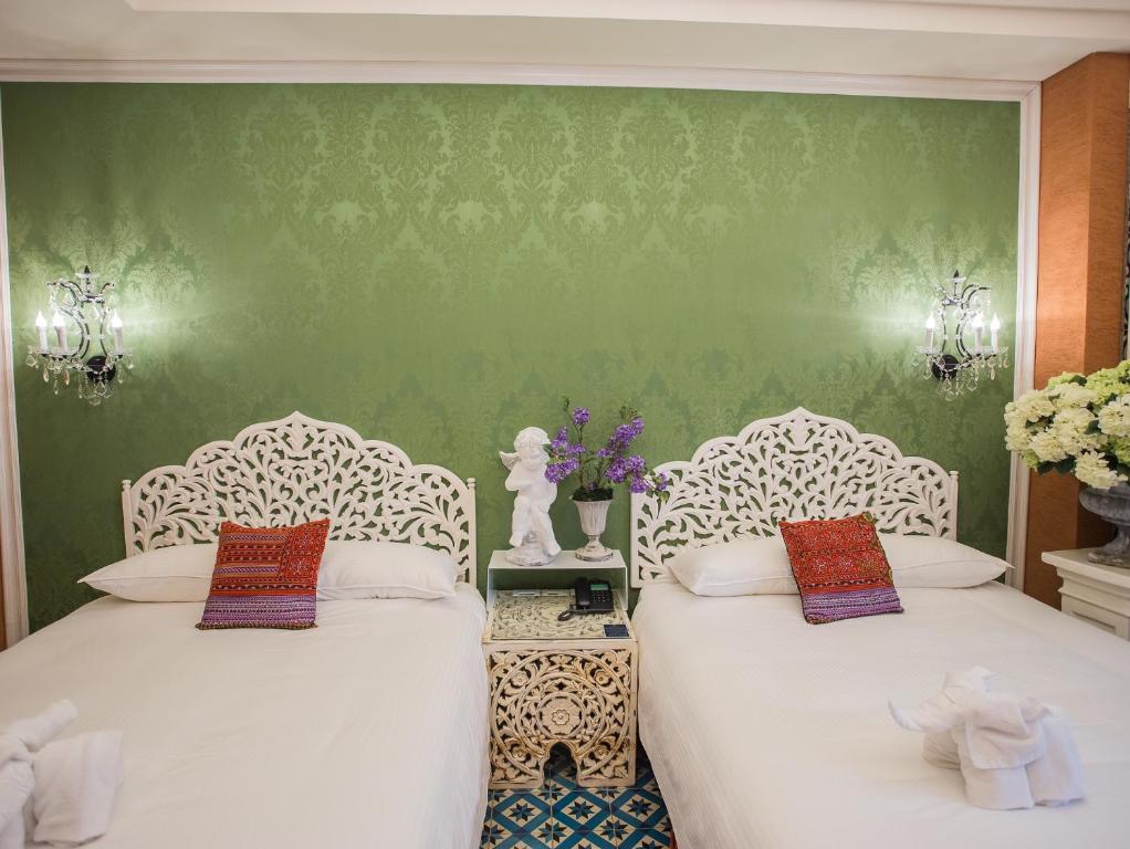 Postel nebo postele na pokoji v ubytování Anna King Hotel
