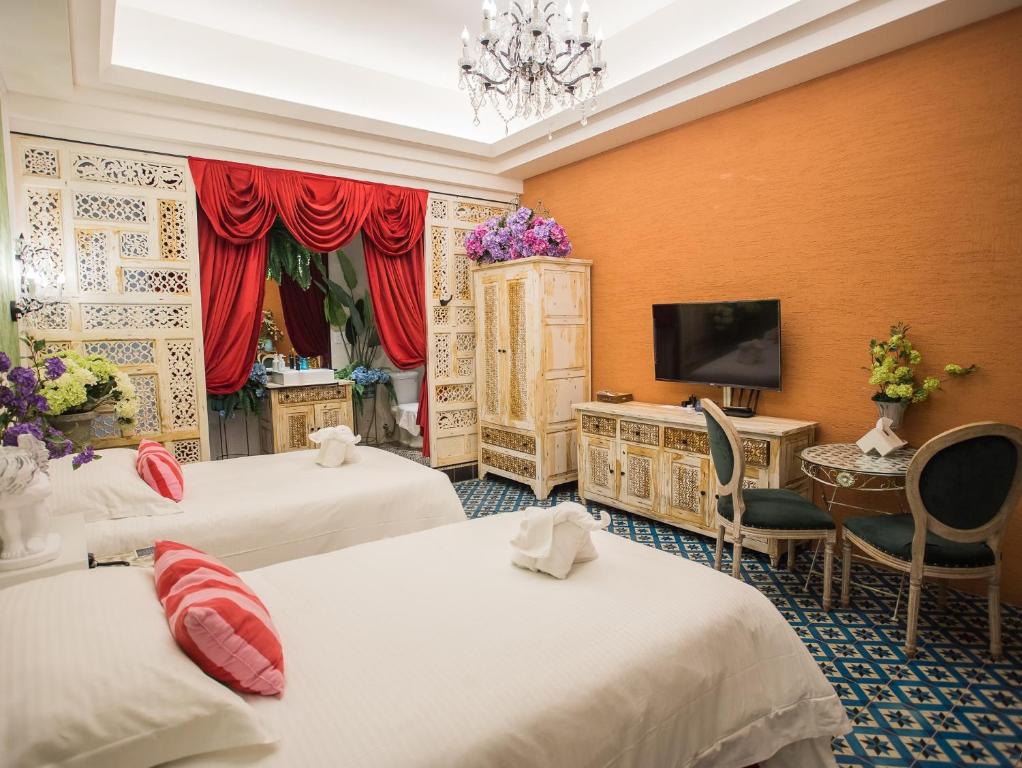Postel nebo postele na pokoji v ubytování Anna King Hotel