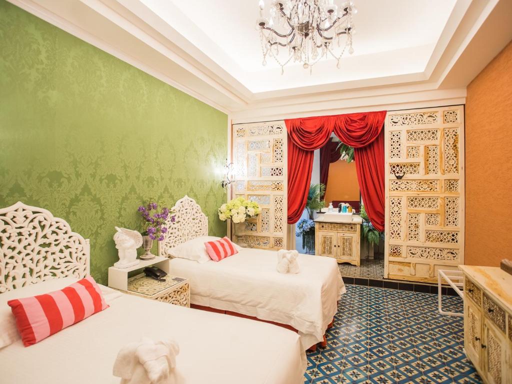 Postel nebo postele na pokoji v ubytování Anna King Hotel