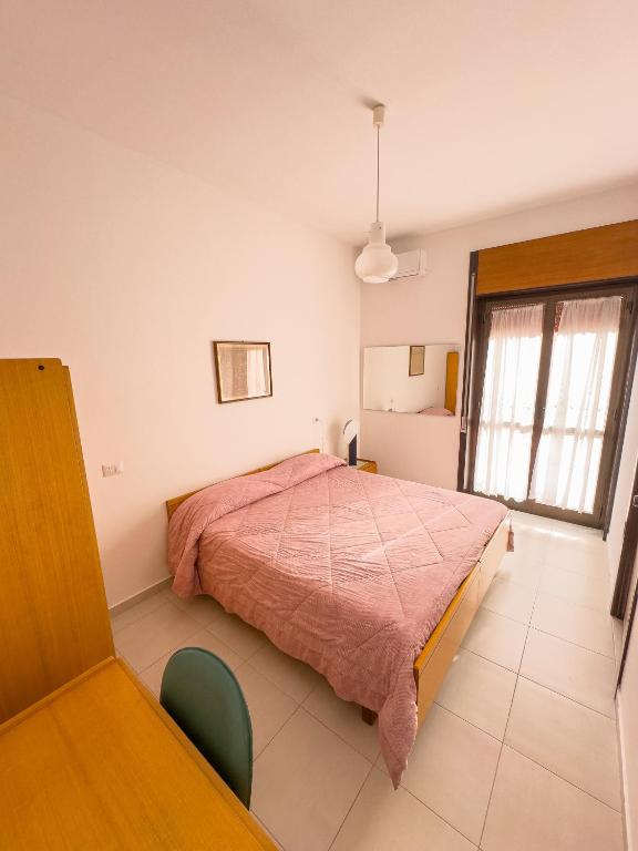 Postel nebo postele na pokoji v ubytování HOTEL 1+1 di C.Costabile & f.lli