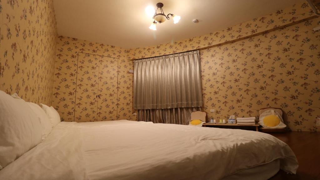 Postel nebo postele na pokoji v ubytování Bright Starry Hostel -Vacation in Donggang