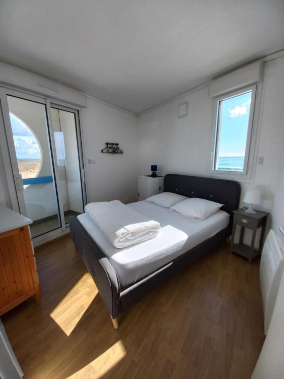 Posteľ alebo postele v izbe v ubytovaní Balcon sur mer