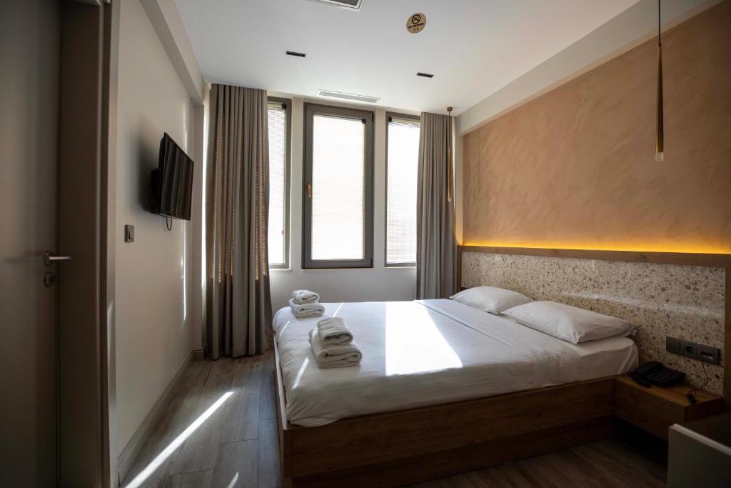 21 Rooms Hotelにあるベッド