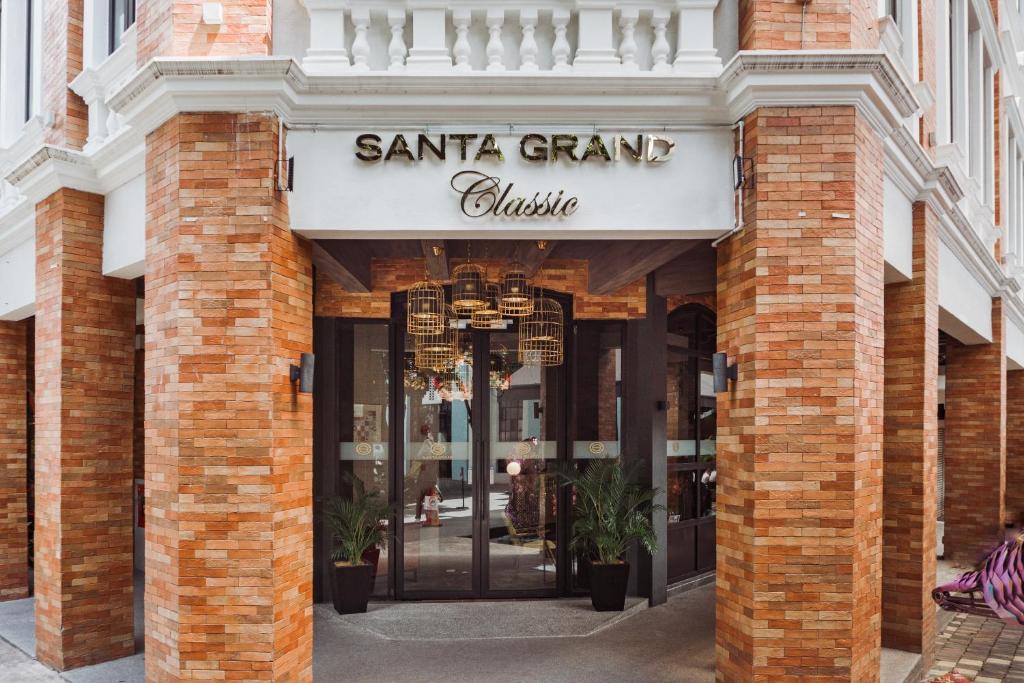 a building with a sign that reads santa grand clinic at Santa Grand Classic Kuala Lumpur, Chinatown in Kuala Lumpur