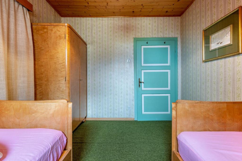 Postel nebo postele na pokoji v ubytování Haus Botter