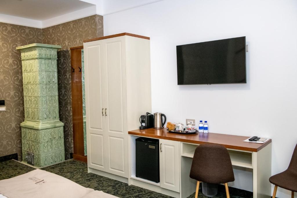 Kuchyň nebo kuchyňský kout v ubytování Agora' Boutique