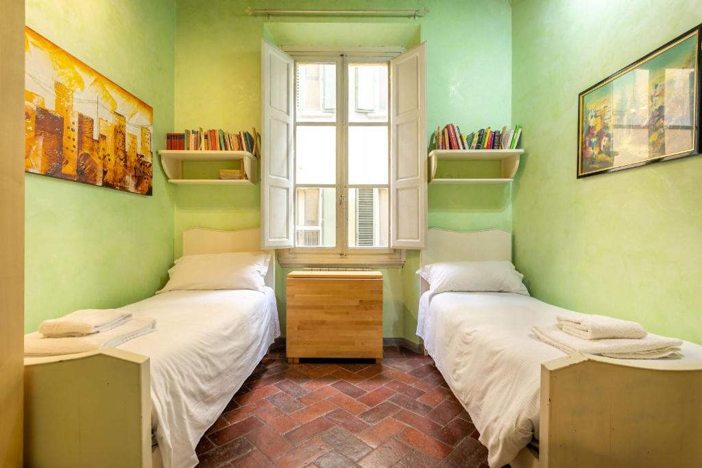 A bed or beds in a room at Antonino by Halldis