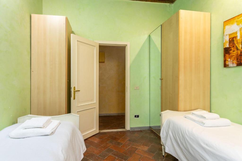 A bed or beds in a room at Antonino by Halldis