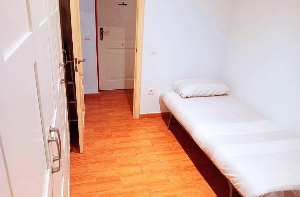 Posteľ alebo postele v izbe v ubytovaní Large Suite Tracatrá Sevilla