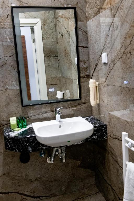 Koupelna v ubytování Agora' Boutique
