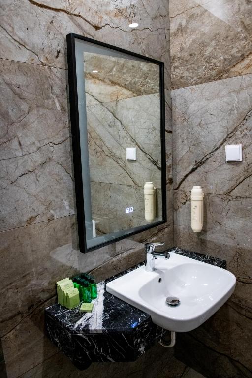 Koupelna v ubytování Agora' Boutique