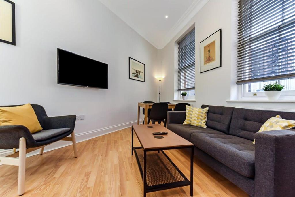 O zonă de relaxare la Modern 2 bedroom flat for 4 in Greater London