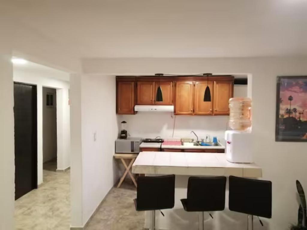 Kuchyňa alebo kuchynka v ubytovaní Habitacion en departamento