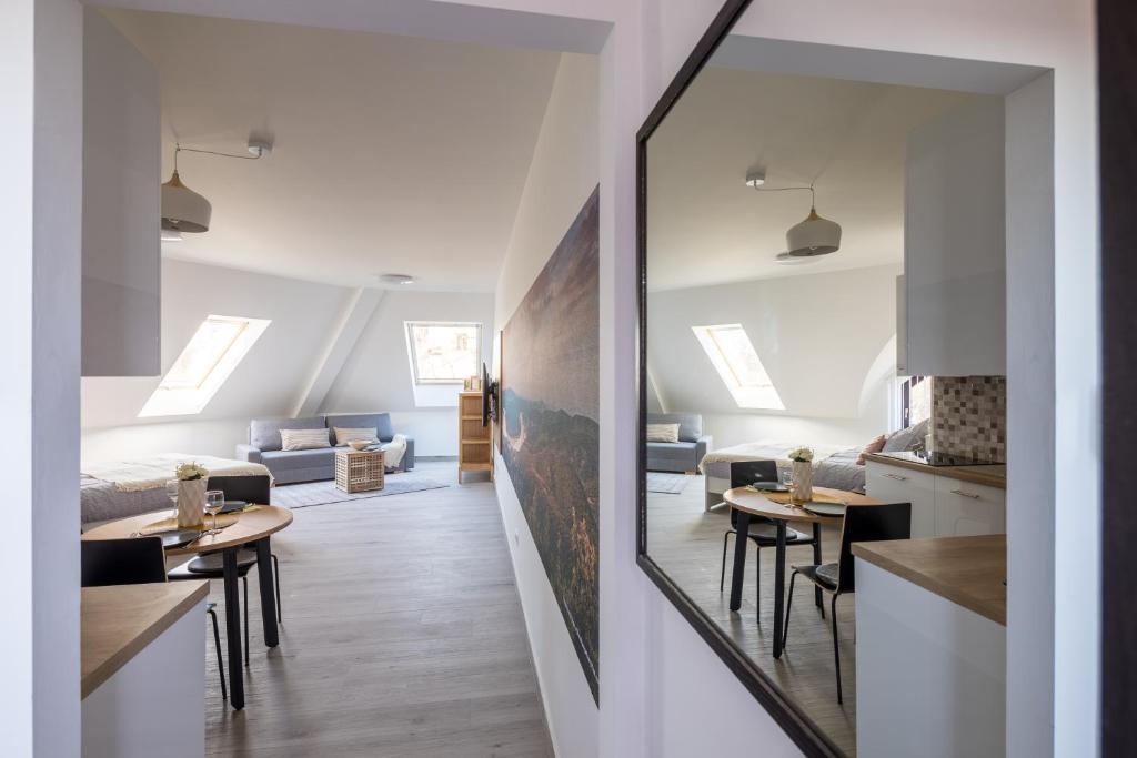 TV a/nebo společenská místnost v ubytování Stafétaház Apartmanok