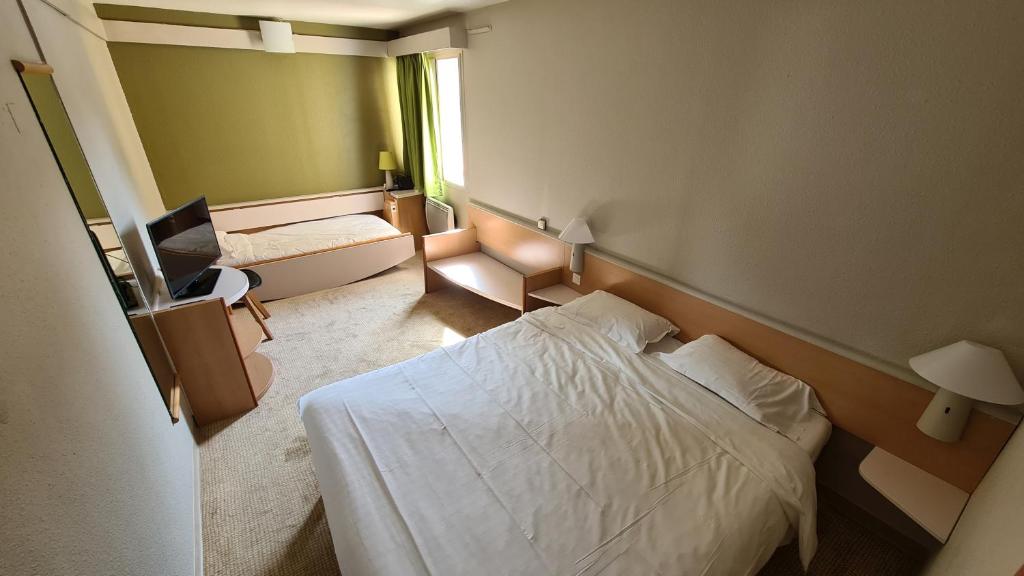 Postel nebo postele na pokoji v ubytování Sweet Home