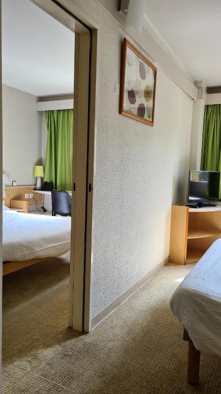 Postel nebo postele na pokoji v ubytování Sweet Home