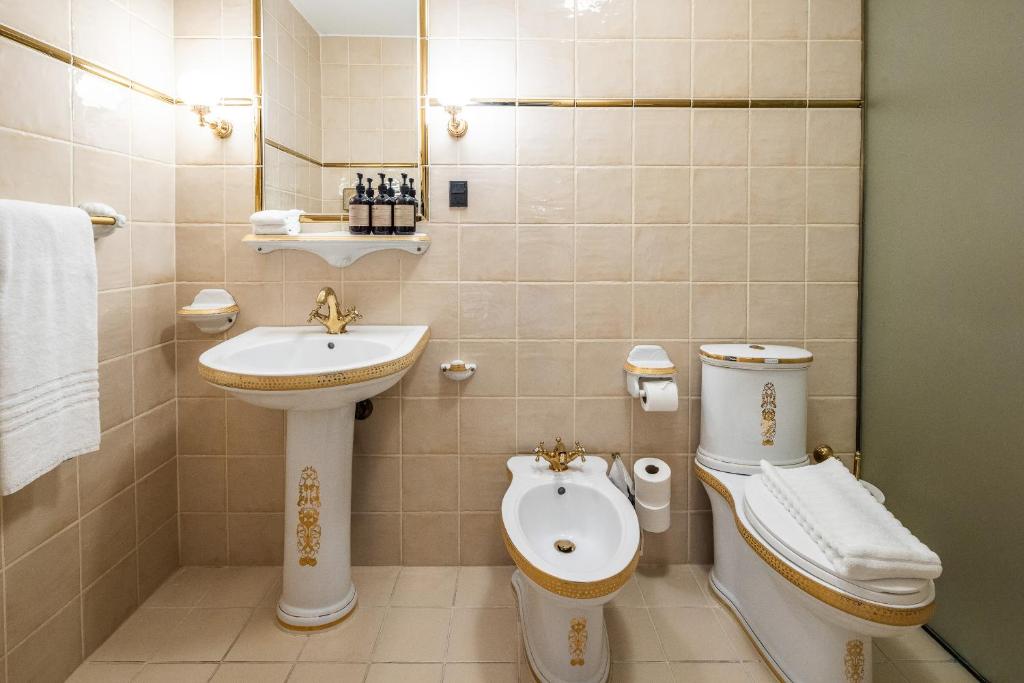 Koupelna v ubytování Hotel Royal