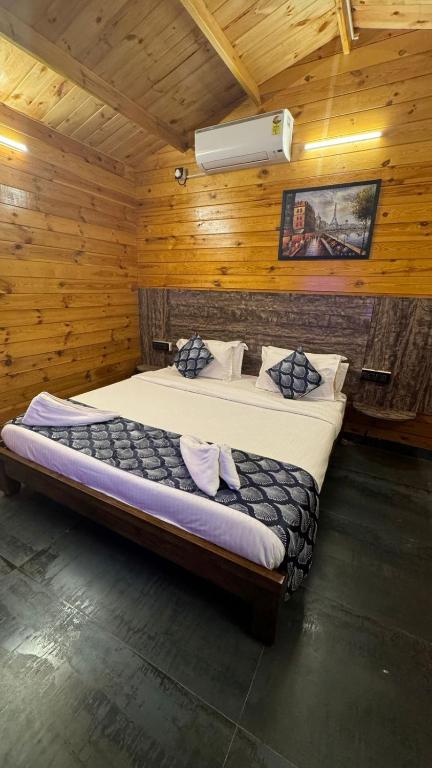 Postel nebo postele na pokoji v ubytování OZIBA BEACH RESORT