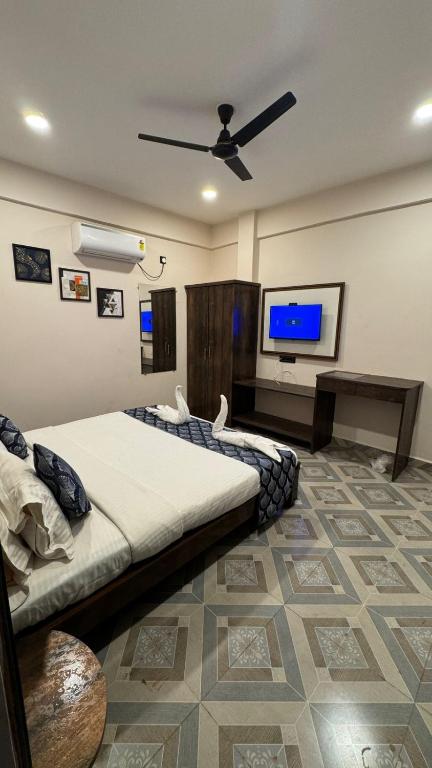 TV a/nebo společenská místnost v ubytování OZIBA BEACH RESORT