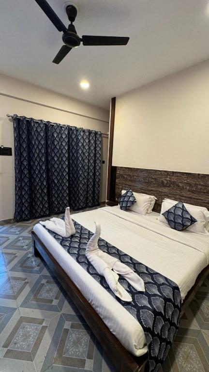 Postel nebo postele na pokoji v ubytování OZIBA BEACH RESORT