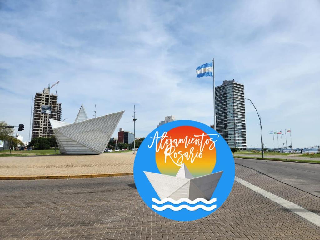 a sign with a paper boat in the middle of a street at HERMOSO MONOAMBIENTE!! UBICACIÓN IDEAL!! PRECIO ÚNICOi! in Rosario