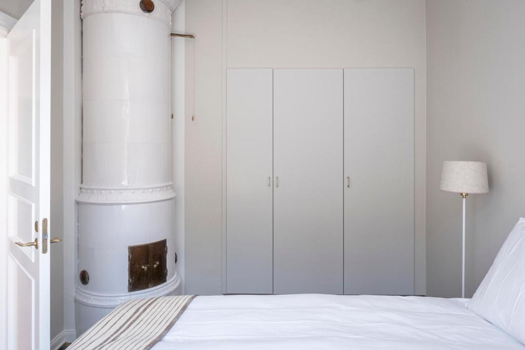 Postel nebo postele na pokoji v ubytování Blå Huset