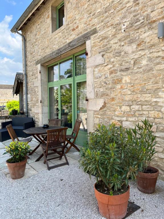 Patio nebo venkovní prostory v ubytování Le Gite de Tassigny