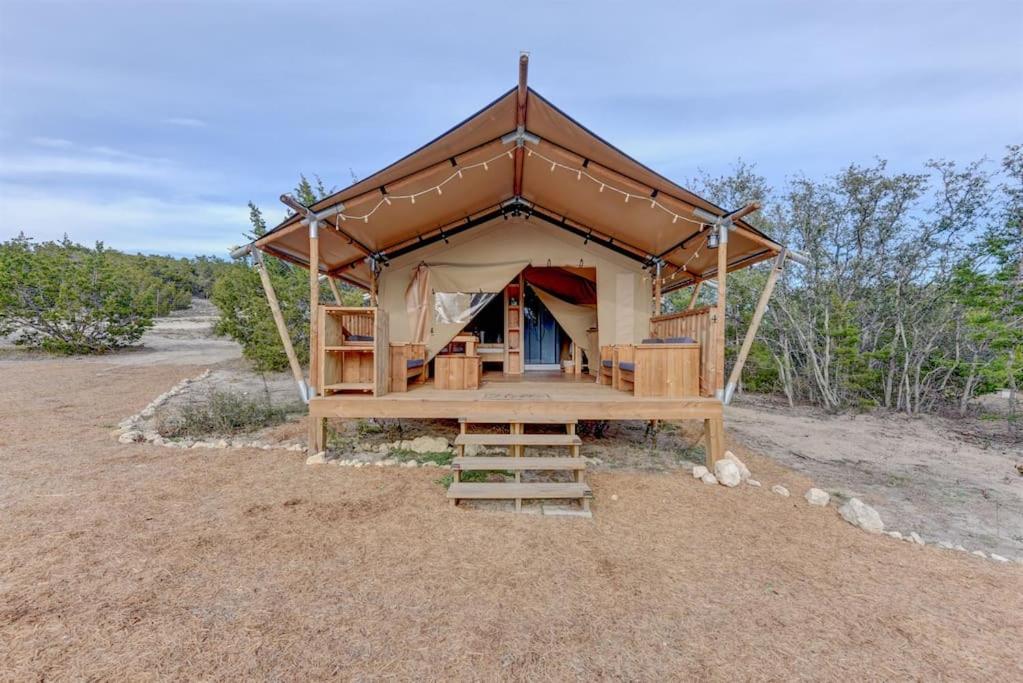 a large tent in the middle of a field at 12 Fires Luxury Glamping with AC #4 in Johnson City