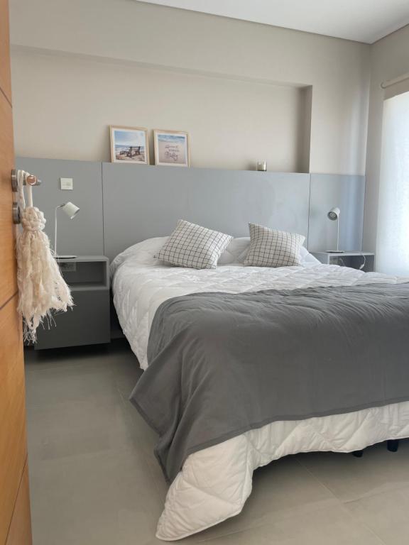 En eller flere senge i et værelse på Exclusivo a Estrenar - Terrazas al Golfo