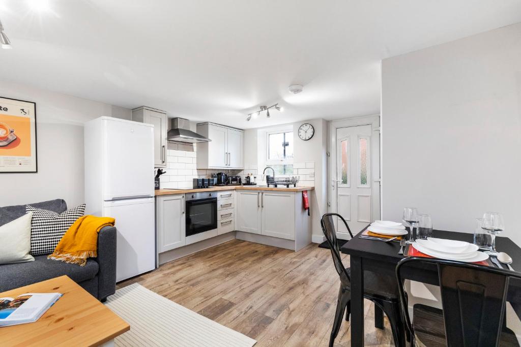 Kuchyň nebo kuchyňský kout v ubytování Cosy One Bed Apt in Leeds City