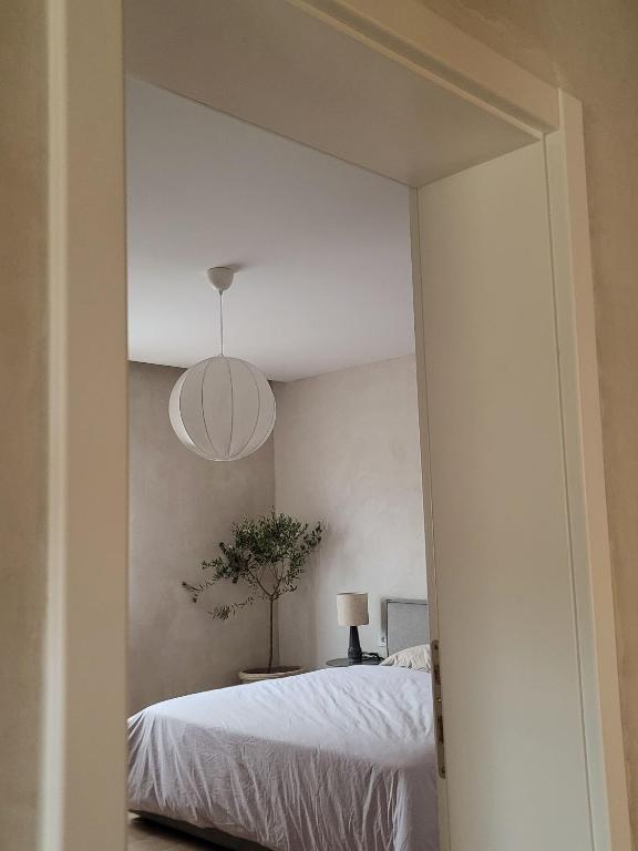 Postel nebo postele na pokoji v ubytování Casa L