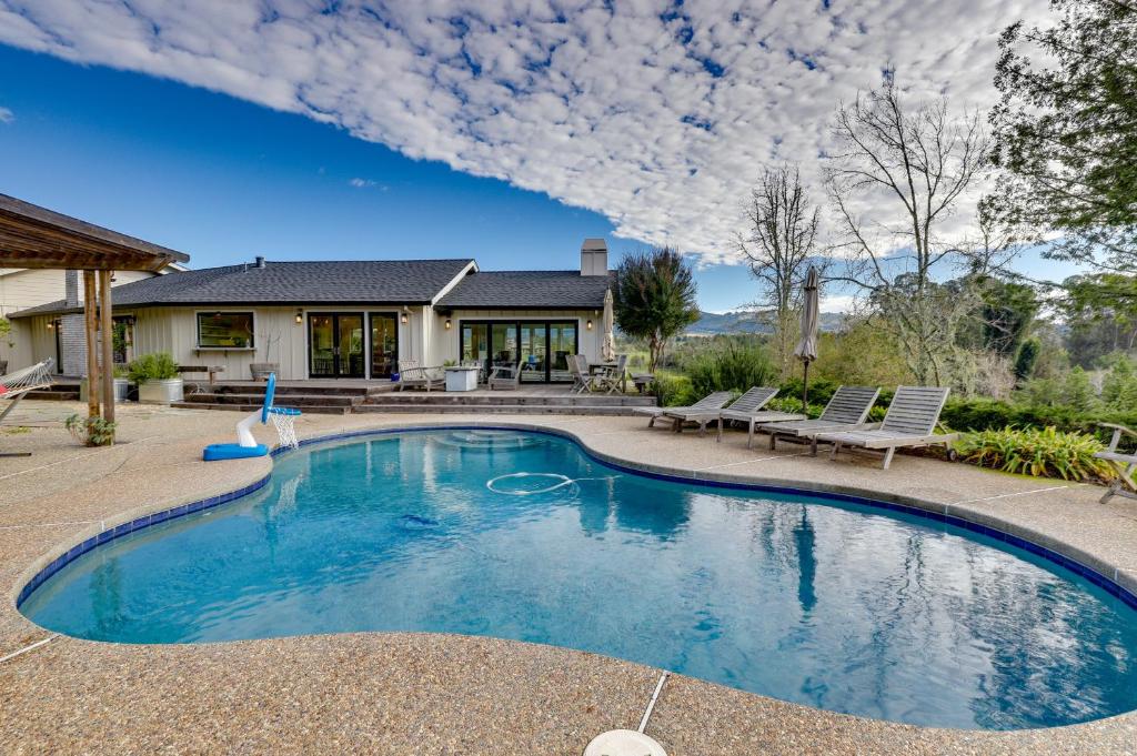 a swimming pool in the backyard of a house at Tranquil Santa Rosa Home with Private Pool and Views! in Santa Rosa