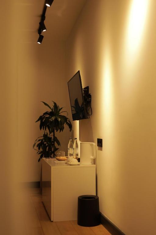 TV a/nebo společenská místnost v ubytování BARBAR APART HOTEL