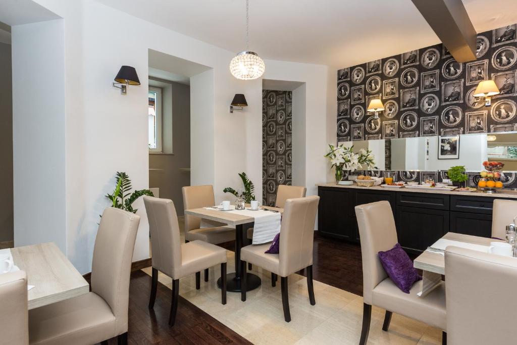 Posedenie v ubytovaní Grottger Luxury Boutique Hotel City