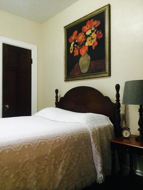 Postel nebo postele na pokoji v ubytování Moreland Guesthouse