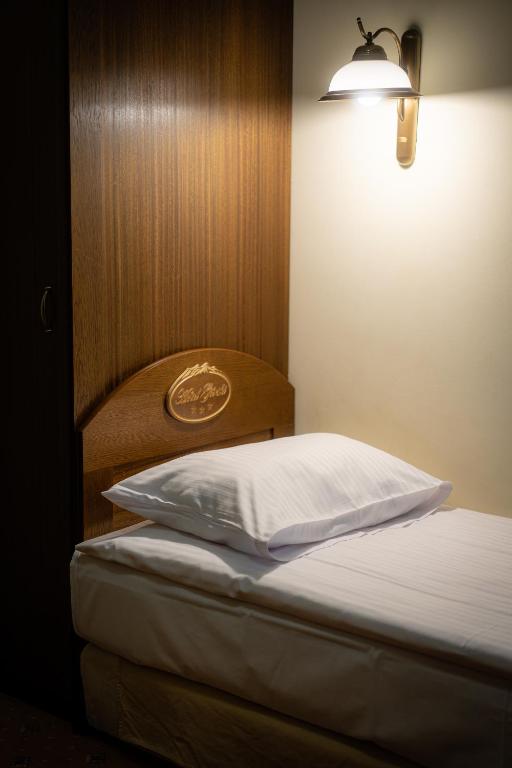 Posteľ alebo postele v izbe v ubytovaní Hotel Górski