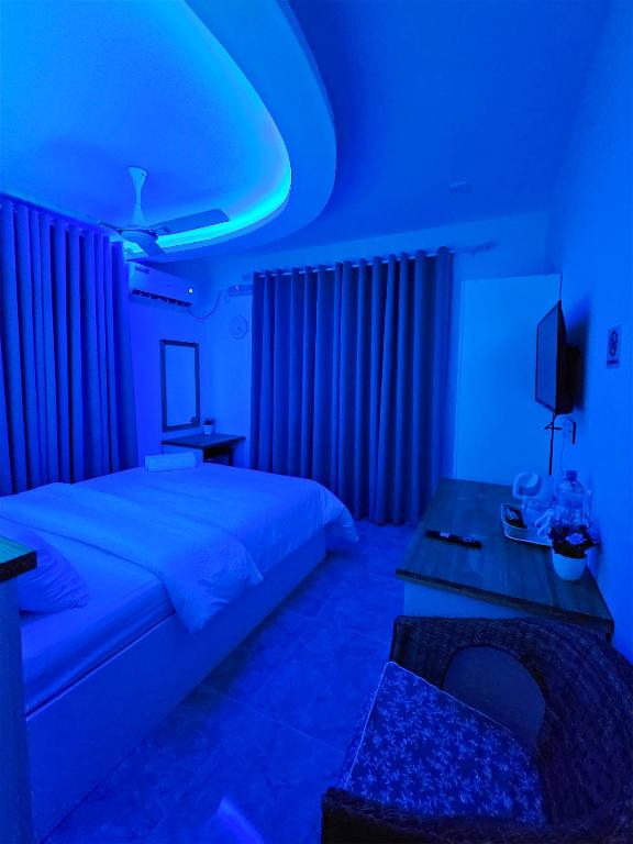 Postel nebo postele na pokoji v ubytování Keveli Guesthouse