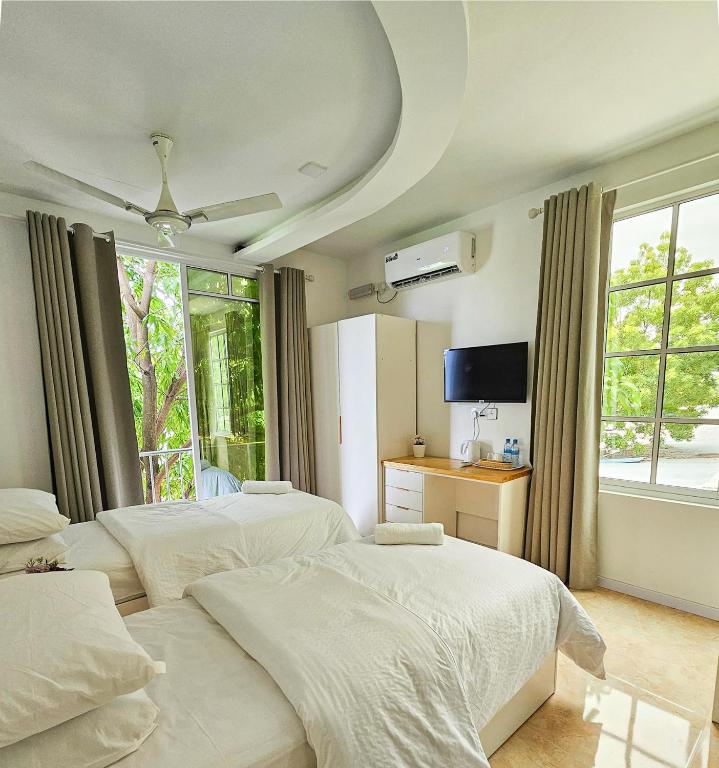 Postel nebo postele na pokoji v ubytování Keveli Guesthouse