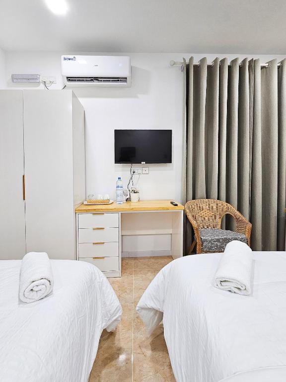 Postel nebo postele na pokoji v ubytování Keveli Guesthouse