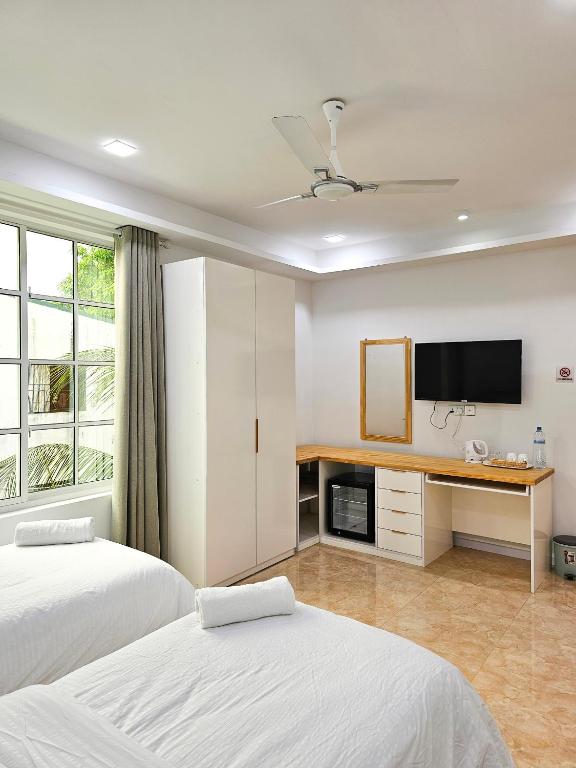 Postel nebo postele na pokoji v ubytování Keveli Guesthouse