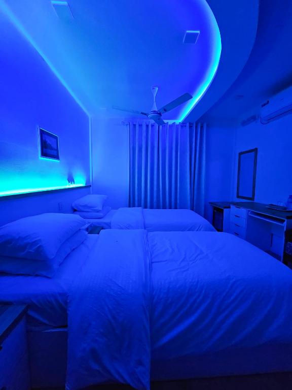 Postel nebo postele na pokoji v ubytování Keveli Guesthouse