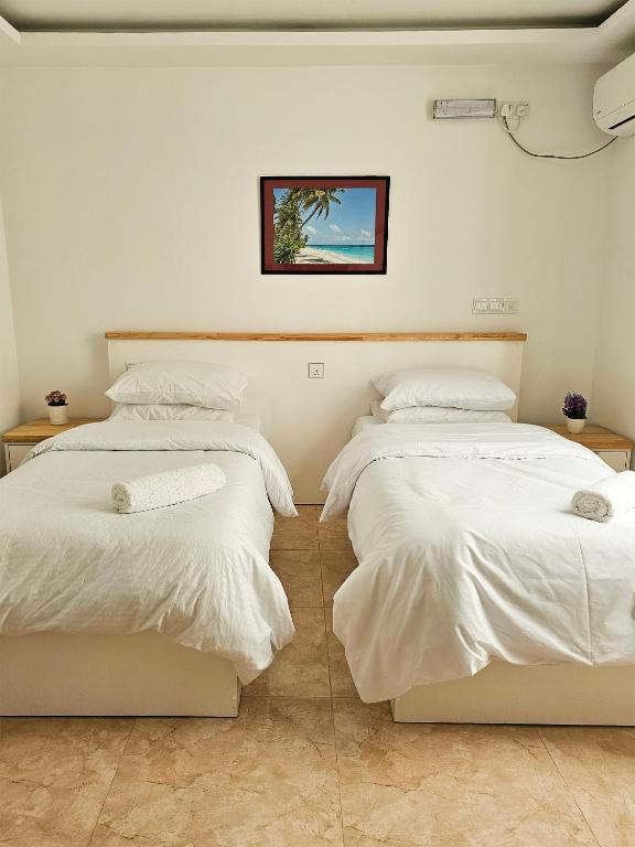 Postel nebo postele na pokoji v ubytování Keveli Guesthouse