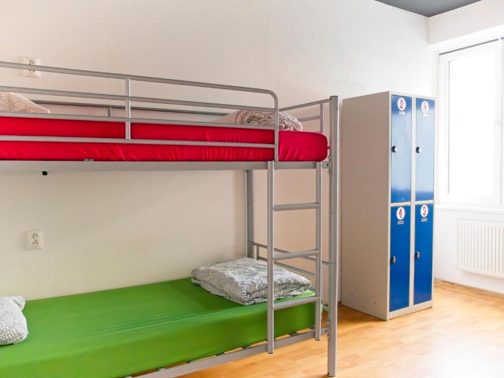 Postel nebo postele na pokoji v ubytování Urban Elephants Hostel