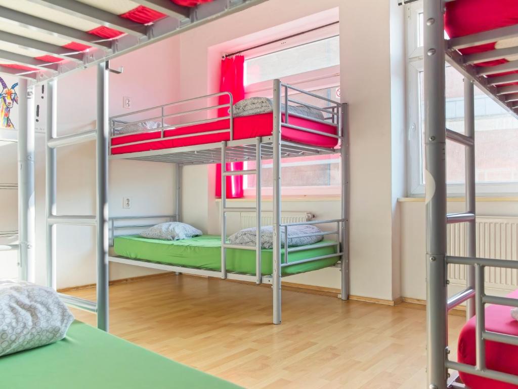 Postel nebo postele na pokoji v ubytování Urban Elephants Hostel