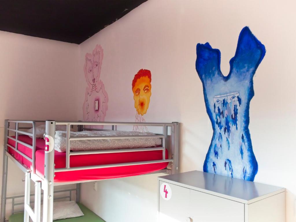 Postel nebo postele na pokoji v ubytování Urban Elephants Hostel